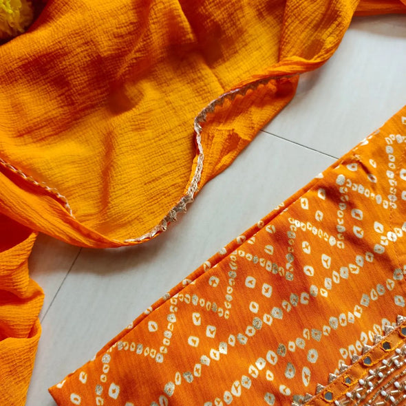 Orange Bandhini kurti with pant and dupatta set